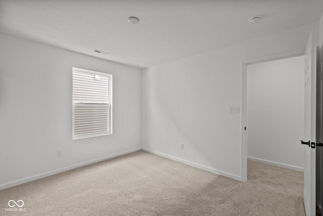 5119 Rolling Meadow Blvd, Indianapolis, IN 46237 - unfurnished room featuring baseboards, visible vents, and carpet