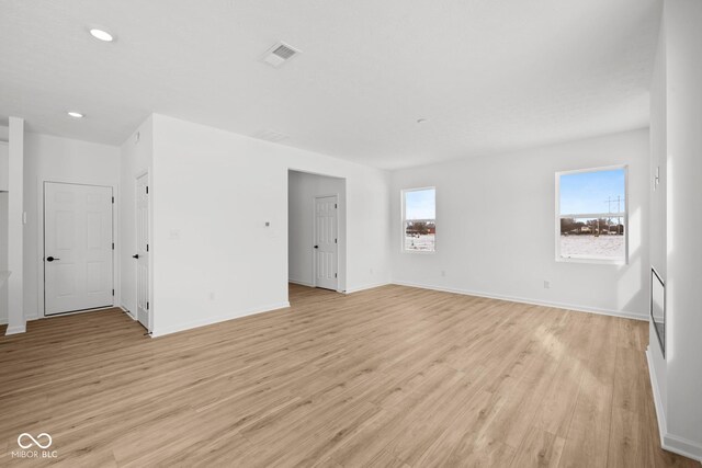 5119 Rolling Meadow Blvd, Indianapolis, IN 46237 - spare room with baseboards, visible vents, light wood-style floors, and recessed lighting