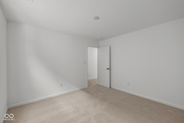 5119 Rolling Meadow Blvd, Indianapolis, IN 46237 - carpeted empty room with baseboards