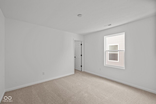 5119 Rolling Meadow Blvd, Indianapolis, IN 46237 - empty room featuring baseboards, visible vents, and carpet floors