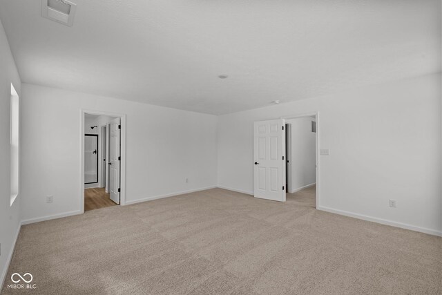 5119 Rolling Meadow Blvd, Indianapolis, IN 46237 - spare room with light carpet, baseboards, and visible vents