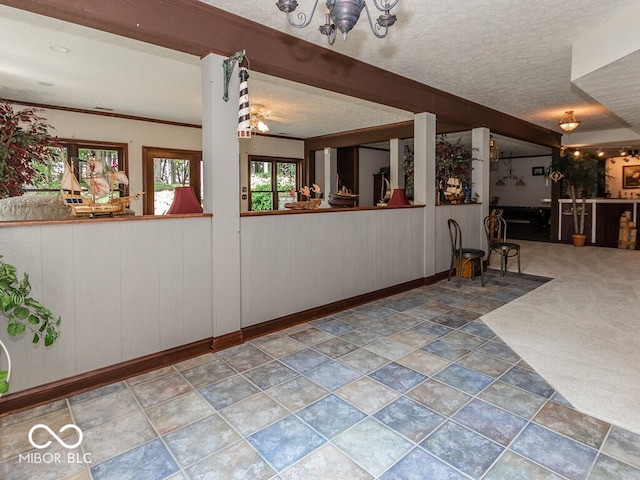 interior space with a textured ceiling