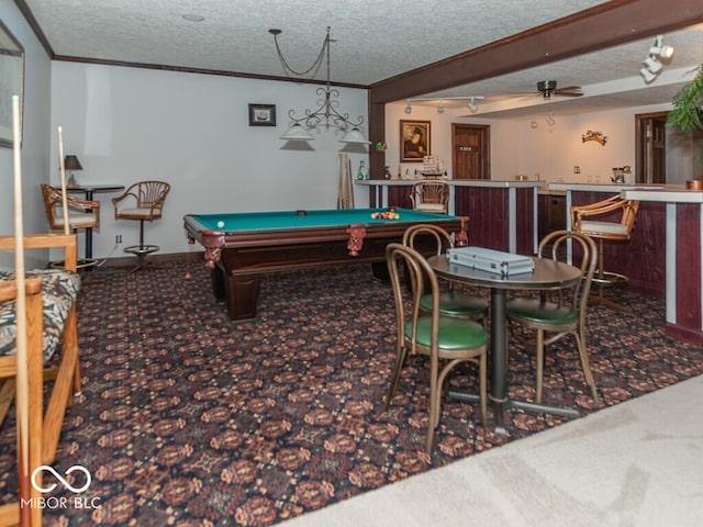 rec room with carpet floors, crown molding, a dry bar, pool table, and a textured ceiling