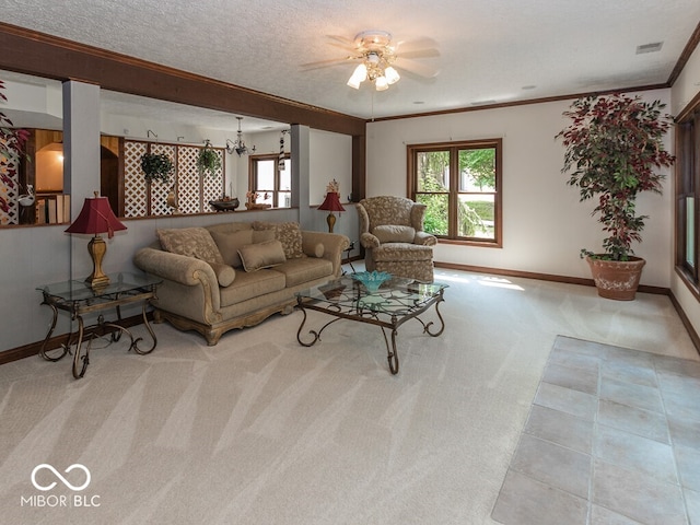 living room featuring a healthy amount of sunlight, visible vents, crown molding, and light carpet