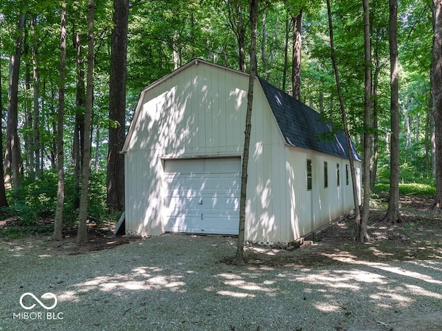 view of outbuilding featuring an outbuilding and gravel driveway