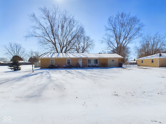 view of snow covered property