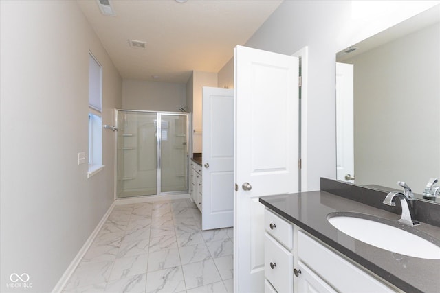 full bathroom featuring visible vents, vanity, baseboards, marble finish floor, and a stall shower