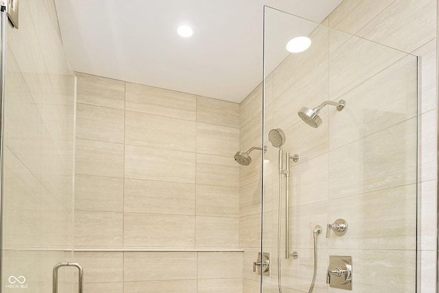 bathroom featuring a stall shower