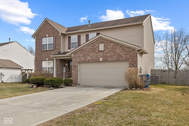 traditional-style home featuring driveway, fence, a front lawn, and brick siding