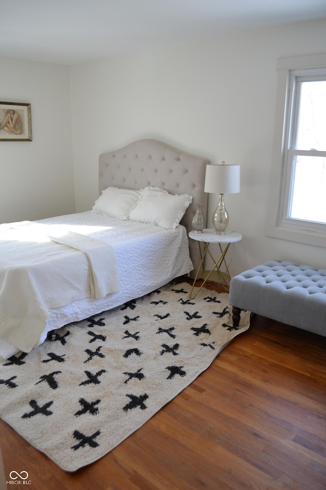 bedroom featuring hardwood / wood-style flooring