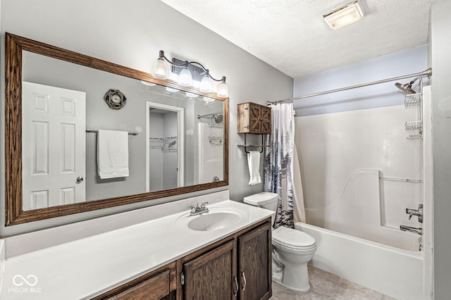 bathroom with toilet, tile patterned flooring, shower / bath combo with shower curtain, a textured ceiling, and vanity