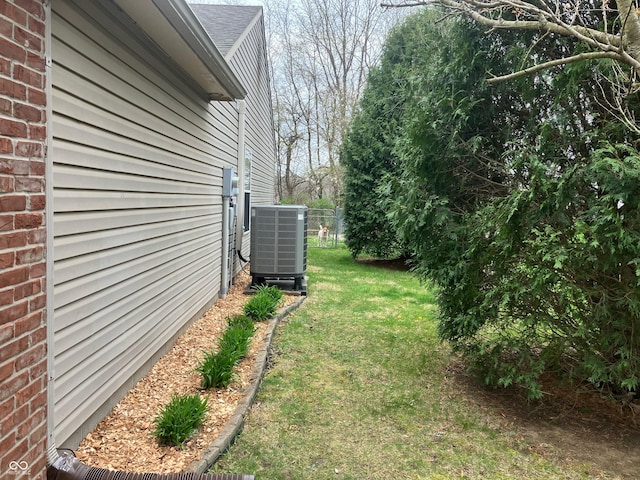 view of yard featuring central AC unit