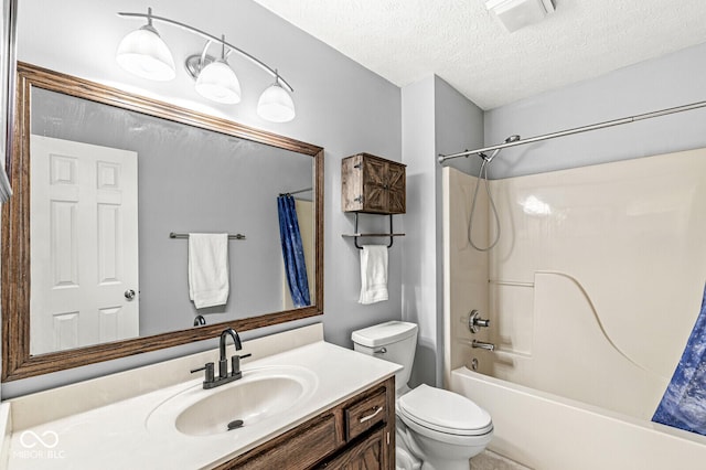 bathroom featuring toilet, shower / bathtub combination with curtain, a textured ceiling, and vanity