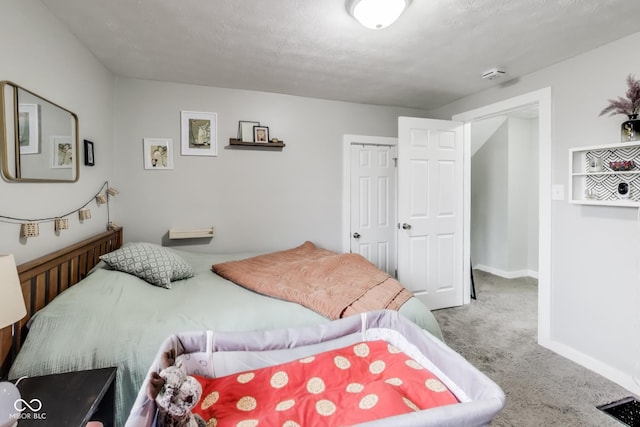 bedroom with carpet, visible vents, and baseboards