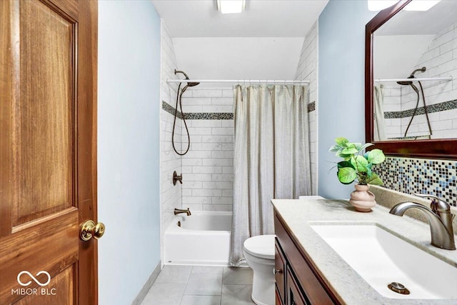 full bathroom featuring tile patterned floors, vanity, toilet, and shower / bath combination with curtain