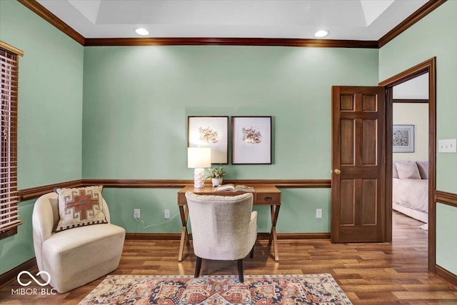 office space with ornamental molding and hardwood / wood-style floors