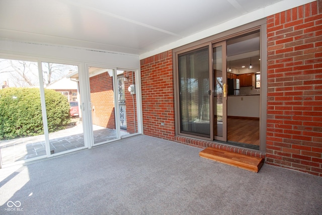 unfurnished sunroom with a wealth of natural light