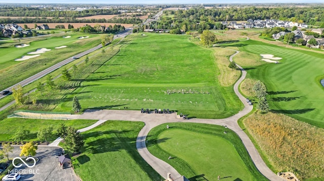 birds eye view of property featuring view of golf course