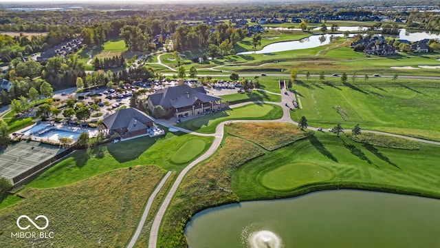 aerial view featuring a water view and golf course view