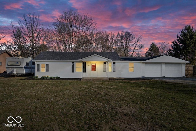 ranch-style home featuring a front lawn