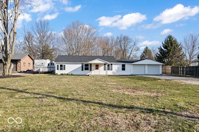 ranch-style home featuring a garage, driveway, a front lawn, and fence