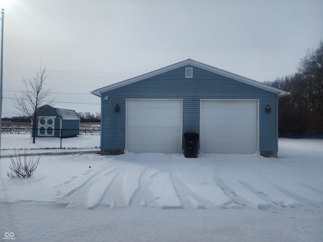 view of snow covered garage