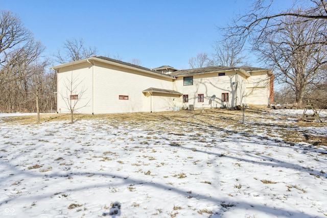 view of snow covered house