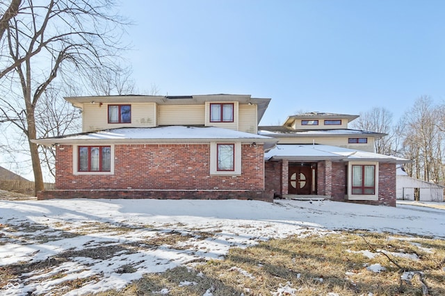 view of front of property featuring brick siding