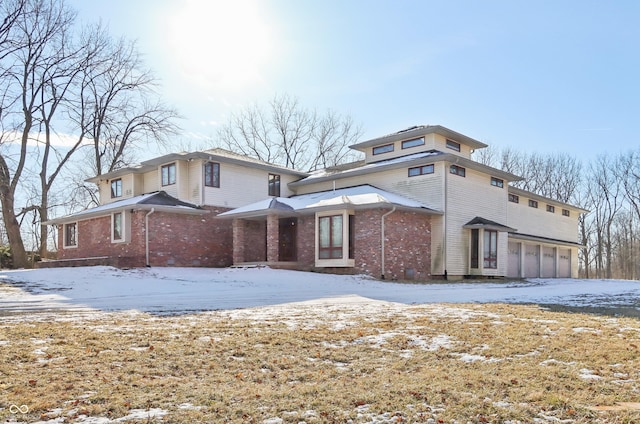 view of front of property with brick siding