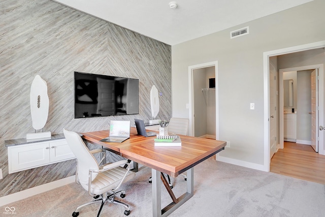2134 Boxwood Dr, Greenfield, IN 46140 - office area with an accent wall, light colored carpet, visible vents, and baseboards