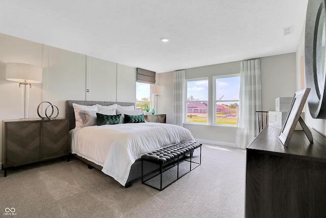 2134 Boxwood Dr, Greenfield, IN 46140 - bedroom with carpet floors, baseboards, and visible vents