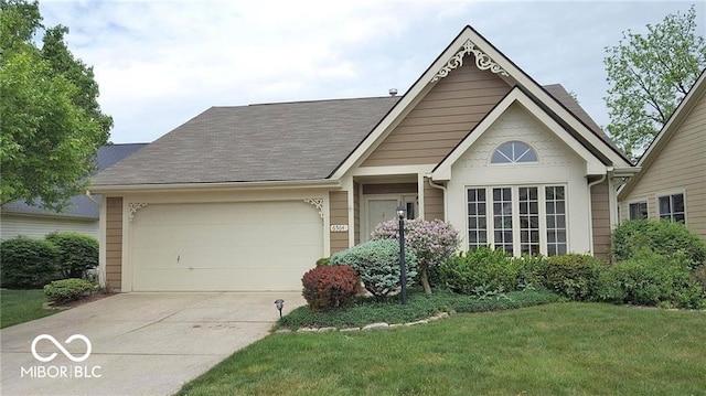 ranch-style home with driveway, an attached garage, a front lawn, and a shingled roof