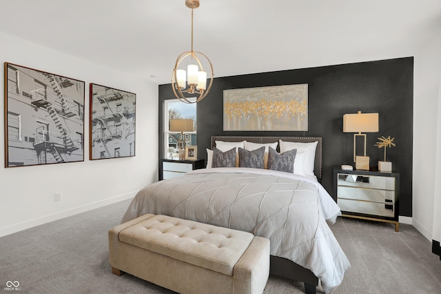 carpeted bedroom featuring baseboards