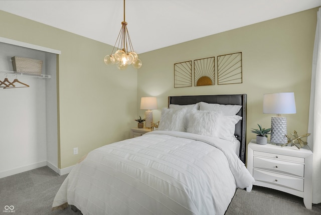 bedroom featuring baseboards, carpet floors, and a notable chandelier