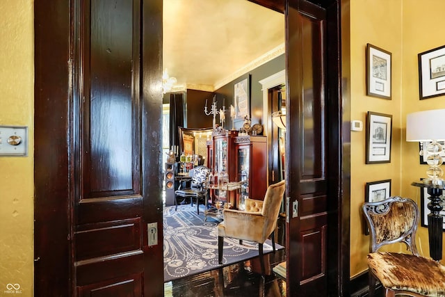 hallway featuring ornamental molding