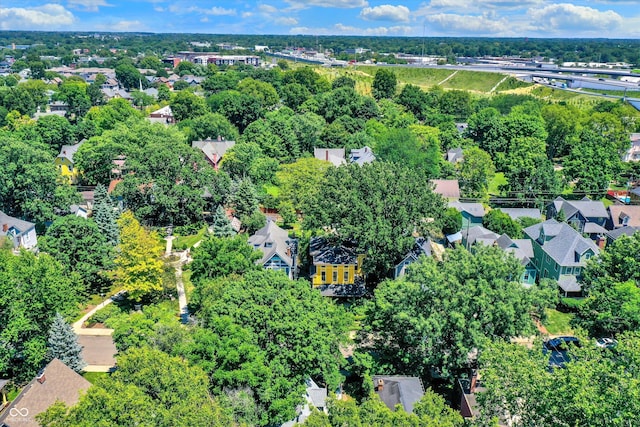 birds eye view of property with a residential view