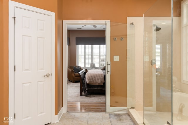 hall featuring light tile patterned flooring