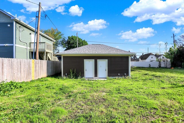 1624 Prospect St, Indianapolis, IN 46203 - exterior space featuring fence and an outbuilding