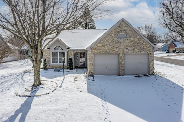 single story home featuring a garage