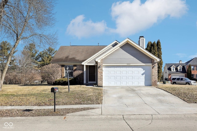 ranch-style house with a garage, brick siding, concrete driveway, a chimney, and a front yard