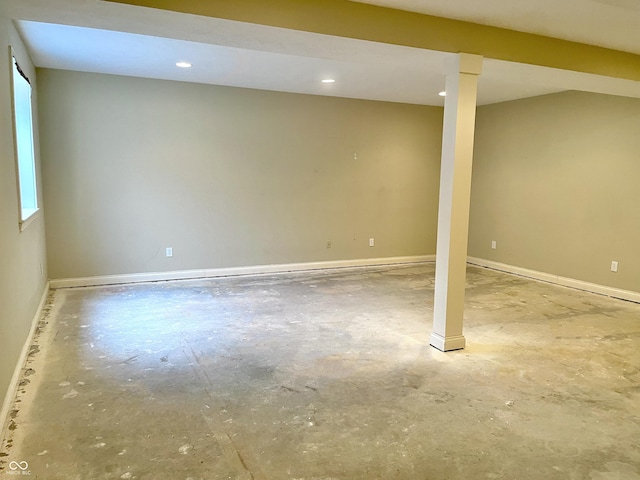 below grade area featuring baseboards and recessed lighting