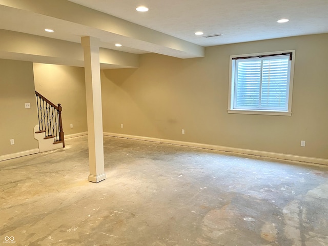 basement with recessed lighting, visible vents, stairway, and baseboards