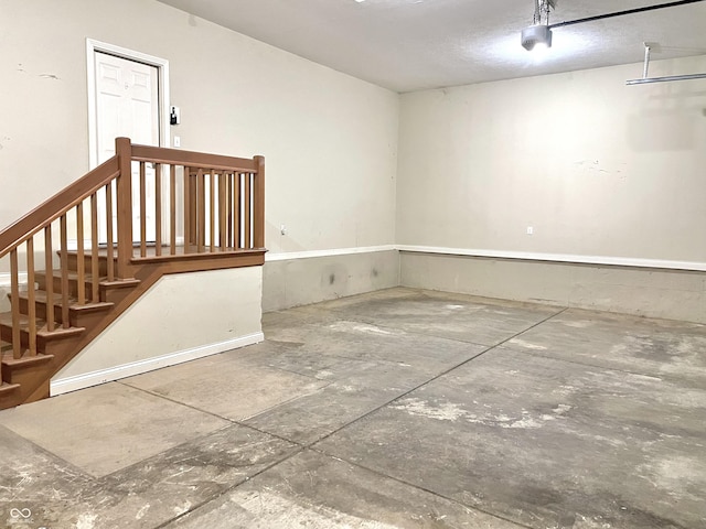 spare room with concrete flooring