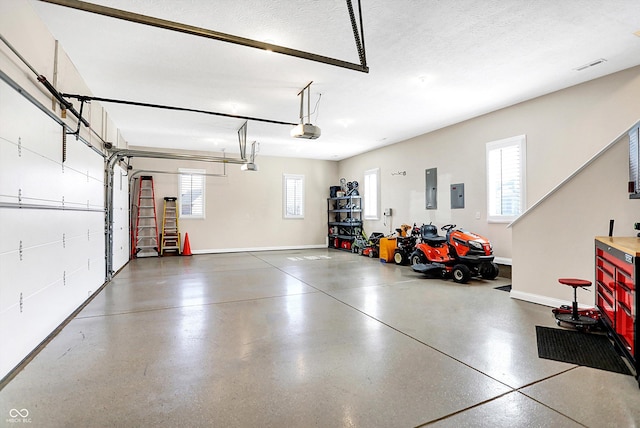 2110 Cheviot Ct, Greenwood, IN 46143 - garage with a garage door opener, electric panel, and baseboards