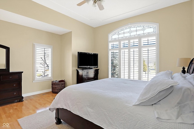 2110 Cheviot Ct, Greenwood, IN 46143 - bedroom with wood finished floors, baseboards, and a ceiling fan
