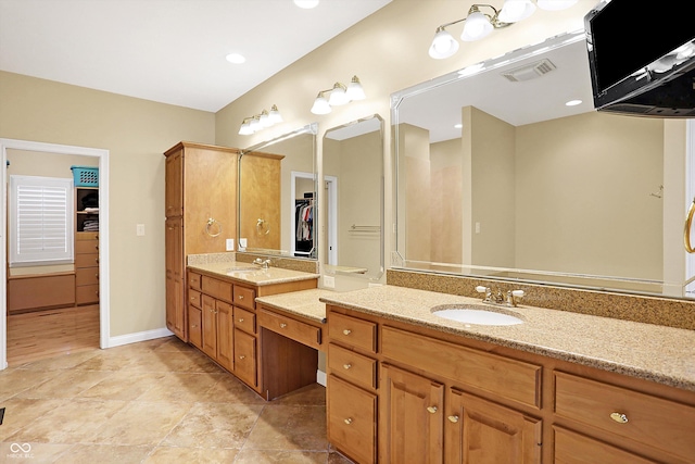 2110 Cheviot Ct, Greenwood, IN 46143 - bathroom with vanity and a walk in closet