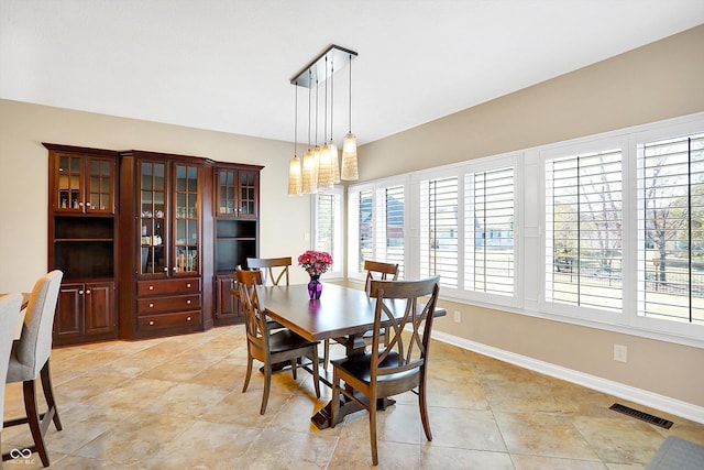 2110 Cheviot Ct, Greenwood, IN 46143 - dining area with baseboards and light tile patterned floors