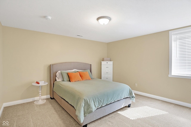 2110 Cheviot Ct, Greenwood, IN 46143 - bedroom with light carpet and baseboards