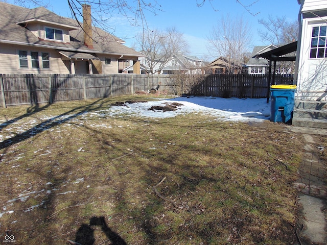 view of yard with a fenced backyard