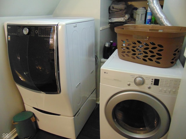 laundry room featuring laundry area and washing machine and dryer